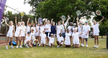 Many young tennis players photographed in front of a tennis court at St Dominics Newcastle for the NKZN tennis trials.