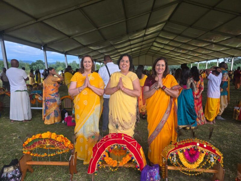 A group of women dressed in cultural attire posing at the Thaipoosam Kavady 2026 in Newcastle.