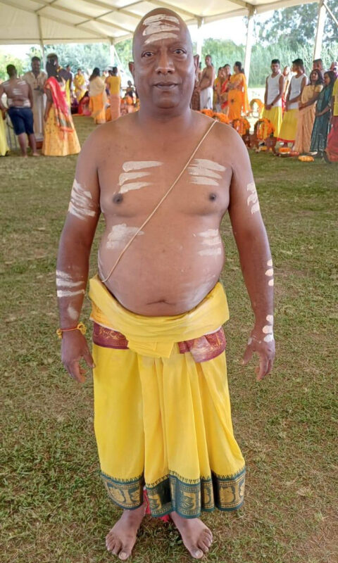 A man dressed in cultural attire posing at the Thaipoosam Kavady 2026 in Newcastle.