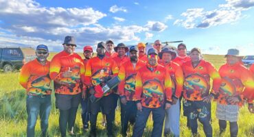 Breakwaters Angling Club members pose for a photo outside.