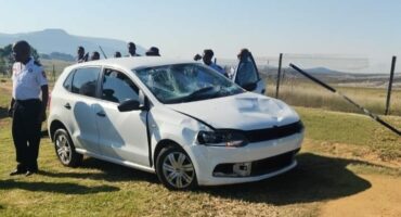 Image of white sedan that hit the pedestrians.