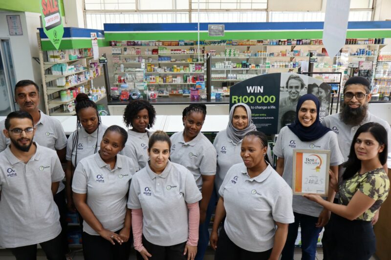 A group of people holding their awards certificate for the Best of Newcastle Readers Choice Awards.