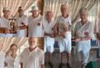 A photo collage of bowls players receiving trophies during a prize giving ceremony.