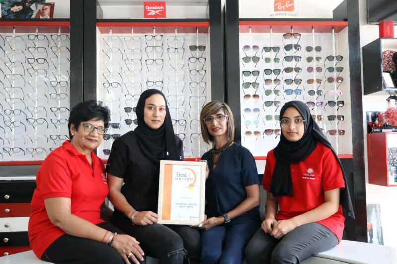 Best of Newcastle 2025 Reader's Choice Award winners receiving their certificates from a Newcastle Advertiser representative in their office.