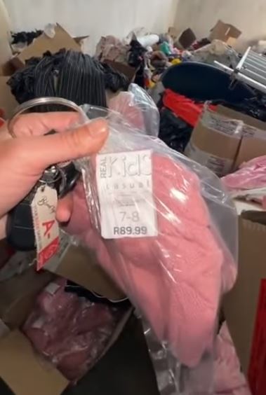 Boxes of tags belonging to a major retailer brand is found at a Chinese Sweat Shop located in Newcastle's Riverside Industrial.