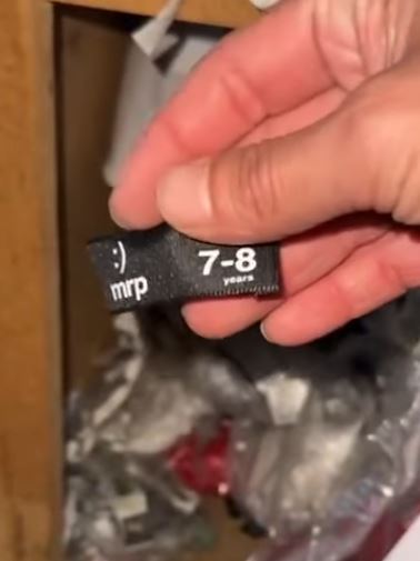 Boxes of tags belonging to a major retailer brand is found at a Chinese Sweat Shop located in Newcastle's Riverside Industrial.