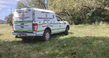 A mortuary van is pictured in Trim Park after a man was found dead.