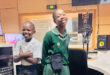 An image of two learners from Harpo Primary School at the Ukhozi FM radio station in Durban. They were invited to recite their poems live at the SABC studios.