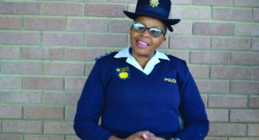 Image of police woman in uniform.