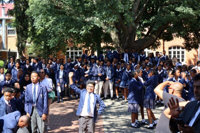 Pupils gather outdoors during St Dominic’s dedication ceremony