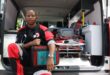 Sakhile Nkosi in the ambulance at Magenta Security Services in Newcastle. He is sitting with medical supplies on his lap, as well as a stetascope around his neck.