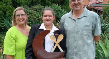 Image of 'Ready Steady Cook' competition winner Zoe Wild with teachers Elsabe Edwards and Pieter Bester of Dundee High.