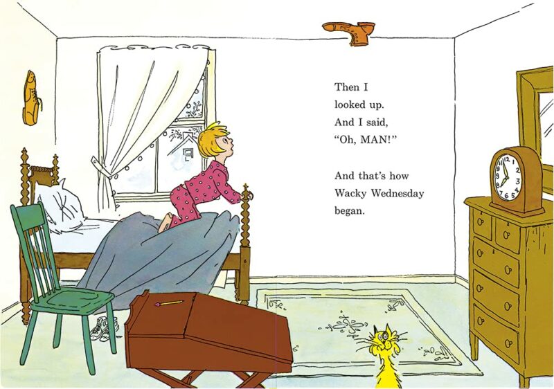 A children's book with illustrations about a boy kneeling on his bed, looking at a shoe stuck to the ceiling in his bedroom. There is a yellow cat in the forefront, with a white wall and a window in the background.