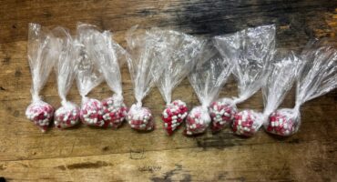 Image of capsules of drugs packed in plastic bags seized by police and place side by side on a table in the Dundee charge office.