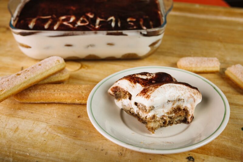 A photo of a Coffee Semifreddo dessert on a wooden table.