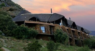 Image of Isandlwana Lodge at sunset.