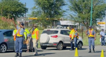 A group of Dannhauser law enforcement officials are photographed during their Easter roadblock Campaign.