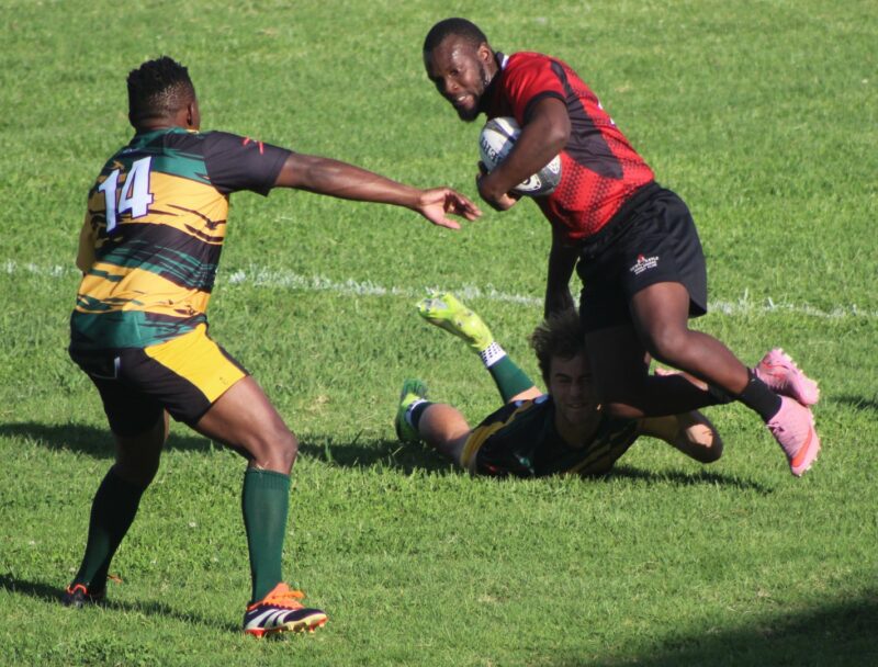 Two rival rugby players are pictured during a rugby match in Newcastle.