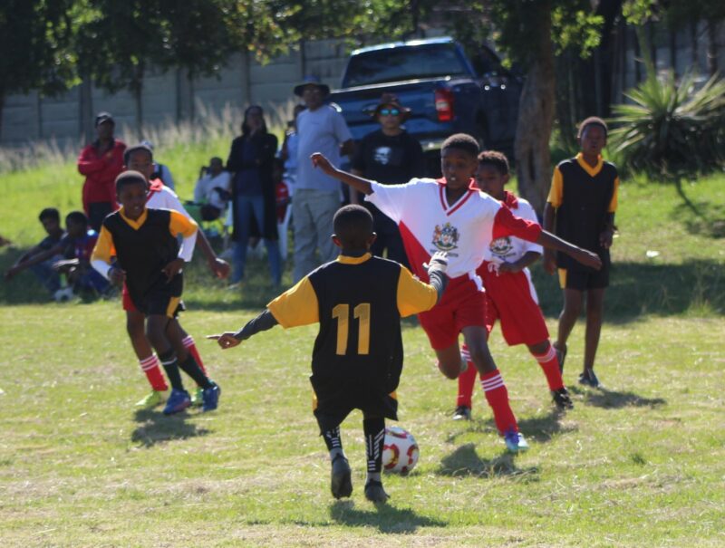 Young soccer players photographed in action during a soccer tournament in Newcastle.