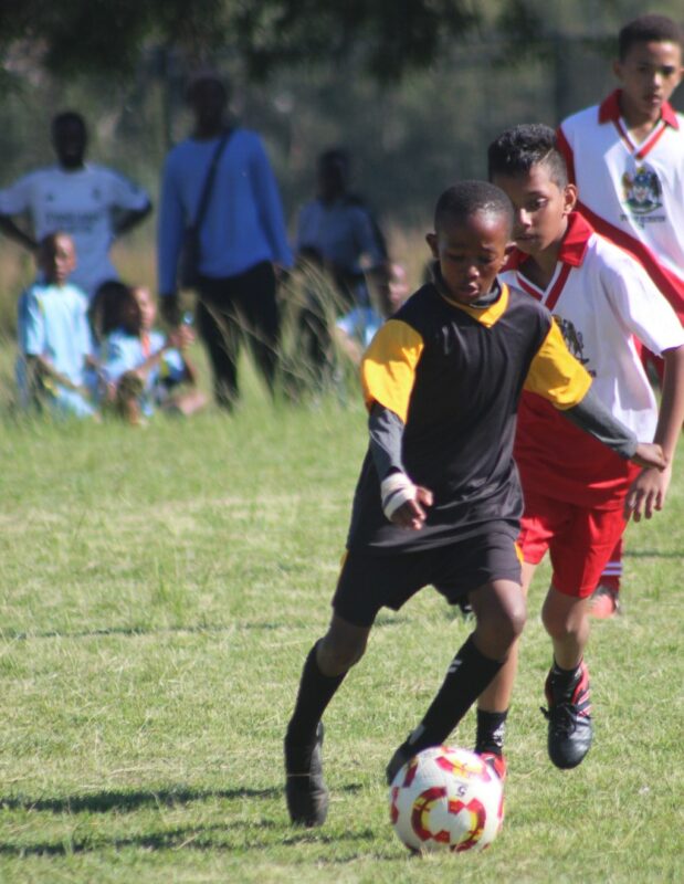Young soccer players photographed in action during a soccer tournament in Newcastle.