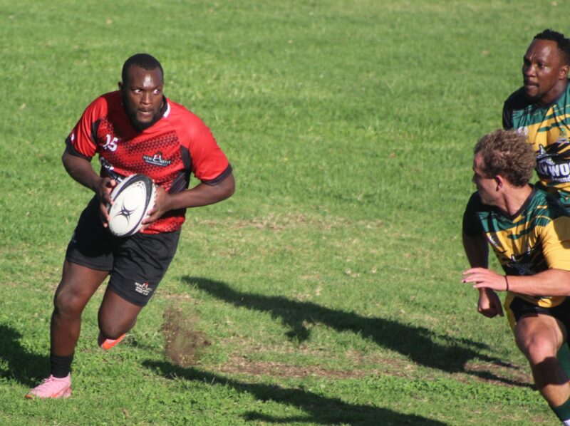 Two rival rugby players are pictured during a rugby match in Newcastle.