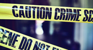 Shot of crime scene tape put up at a scene to warn off people