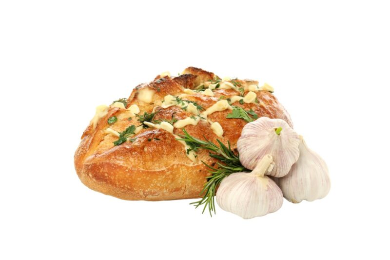 Garlic bread and garlic, isolated on white background