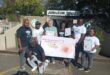 An image of Vryheid's ELM team members with SAVF Jubileum Old Age Home manager Jeanné Stapelberg, after the ELM team made donations on Workers Day.