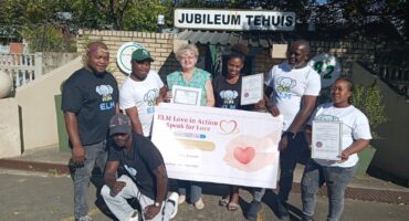An image of Vryheid's ELM team members with SAVF Jubileum Old Age Home manager Jeanné Stapelberg, after the ELM team made donations on Workers Day.