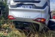 Image of vehicle on its roof.