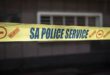 Image of yellow South African Police tape.