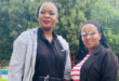 Image of Penelope Mlangeni (psychologist) and Zamatubgwa Khumalo (health promoter practitioner) next to a swimming pool.