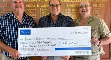 Image of Johan du Plessis (fund chairman), Andrew Adams (Virbac regional manager) and Fritz Botes (Dundee Farm Security manager) holding a symbolic cheque.