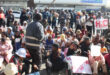 Image of protesters seated outside Umzinyathi's Dundee office.