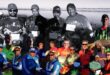 A collage of colour photos on top of a large black and white photo of anglers holding their trophys and prizes after an apl league.