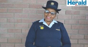 Image of police woman in uniform.