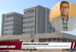 A large photo of the Newcastle Municipality building, with a smaller photo of an indian male in a round frame. A red and white banner with bold black text written inside it.