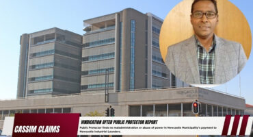 A large photo of the Newcastle Municipality building, with a smaller photo of an indian male in a round frame. A red and white banner with bold black text written inside it.