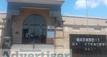 A photo of the Madadeni magistrates Court with a transparent logo of the Newcastle Advertiser.