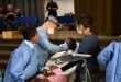 Image of learners being attend to at the Rotary Dental Clinic in Glencoe.