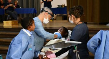 Image of learners being attend to at the Rotary Dental Clinic in Glencoe.