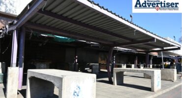 A large feature image of empty hawker shelters in Newcastle's CBD.