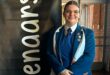 Image of a female learner from Hoërskool Pionier standing next to a 'Redenaars' banner.