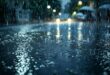 Image of rain on a tar road.