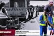 A black and white main background image of municipal workers and their machinery along a busy town route. in the foreground is colour images of municipal workers as well as a bold red and white banner with bold black text.