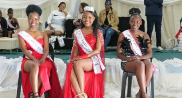 An image of three young girls, wearing their modelling dresses, as they were crowned winners of Miss Independent 2026 pageant at Mondlo on Youth Day.