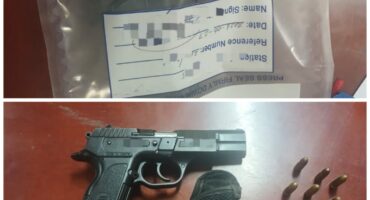 Image of a firearm and ammunition in a SAPS evidence bag.