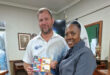 An image of Lukas Coetzer who was crowned the winner of Nardini's Golf Day 2026 with sister Mpume who is the school principal.