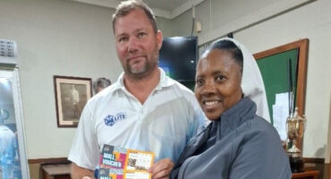 An image of Lukas Coetzer who was crowned the winner of Nardini's Golf Day 2026 with sister Mpume who is the school principal.