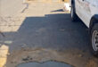 Image of pot-holes fixed on a Dundee road with a bakkie parked adjacent.